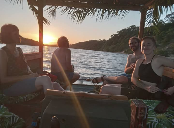 Guests enjoying a sunset cruise on the river